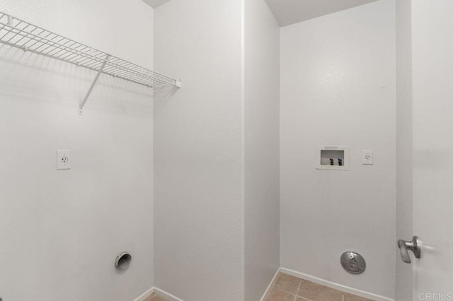 laundry room featuring hookup for a washing machine, laundry area, hookup for an electric dryer, and baseboards