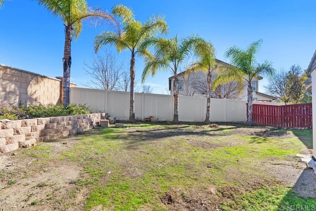 view of yard featuring a fenced backyard