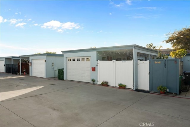 garage featuring fence