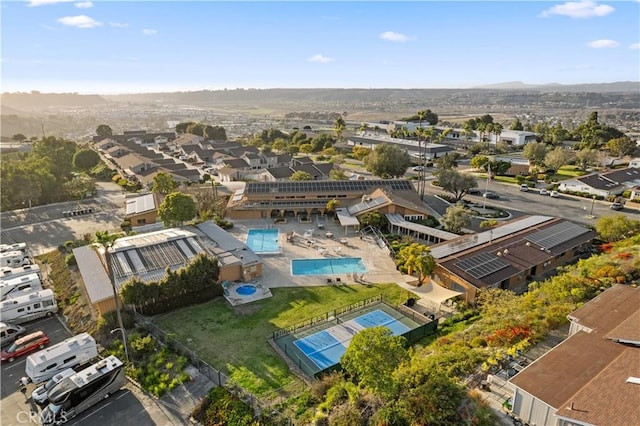 birds eye view of property with a residential view