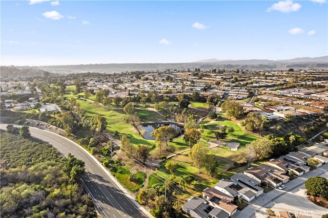 drone / aerial view with a residential view and a water and mountain view