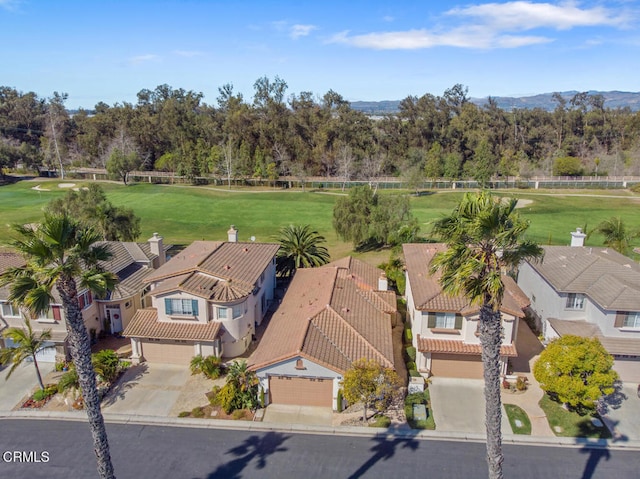 birds eye view of property with a residential view