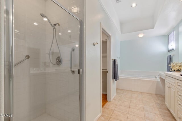 full bath featuring a garden tub, visible vents, vanity, tile patterned floors, and a stall shower