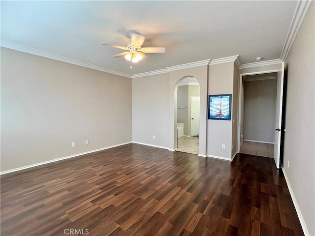 30659 Lajoe St, Menifee, CA 92584 - spare room with arched walkways, ceiling fan, dark wood-style flooring, baseboards, and crown molding