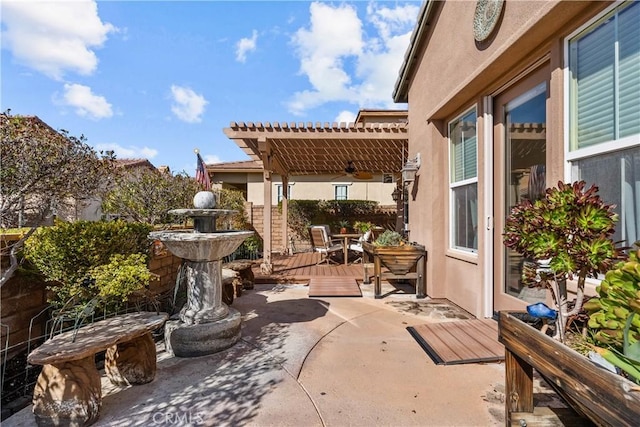 view of patio / terrace featuring outdoor dining space, fence, and a pergola