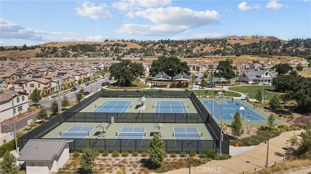 birds eye view of property featuring a residential view and a mountain view