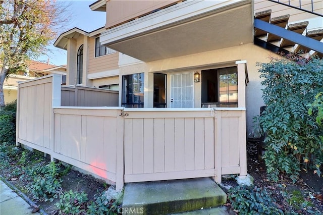 view of property exterior featuring fence