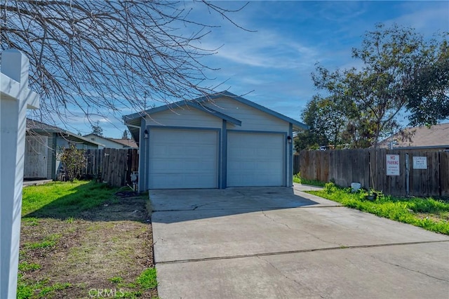 detached garage with fence