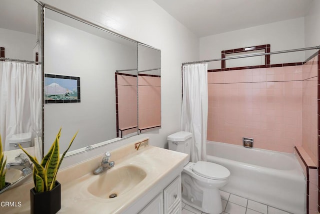 bathroom with tile patterned floors, shower / bathtub combination with curtain, toilet, and vanity