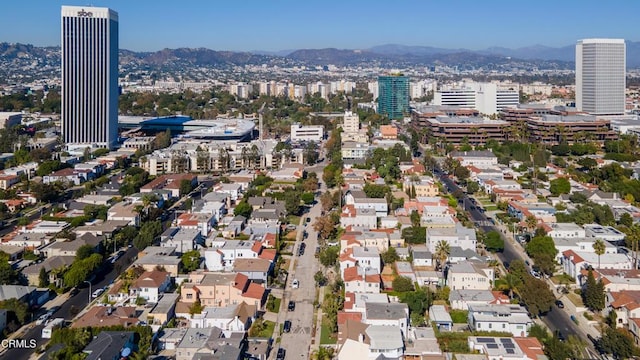 bird's eye view featuring a city view and a mountain view