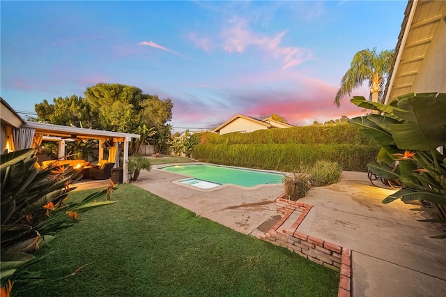 view of pool featuring a patio, a lawn, a fenced in pool, and a fenced backyard