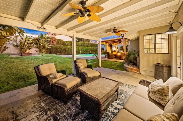 view of patio / terrace with outdoor lounge area, an outdoor pool, and ceiling fan