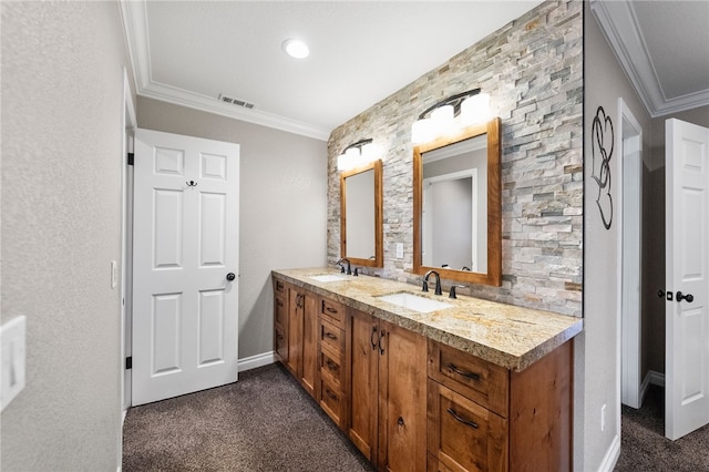 full bath featuring double vanity, ornamental molding, visible vents, and a sink