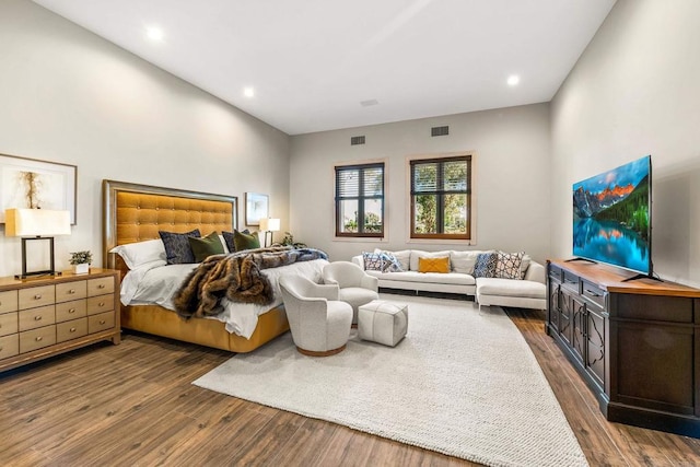 bedroom featuring recessed lighting, visible vents, and wood finished floors