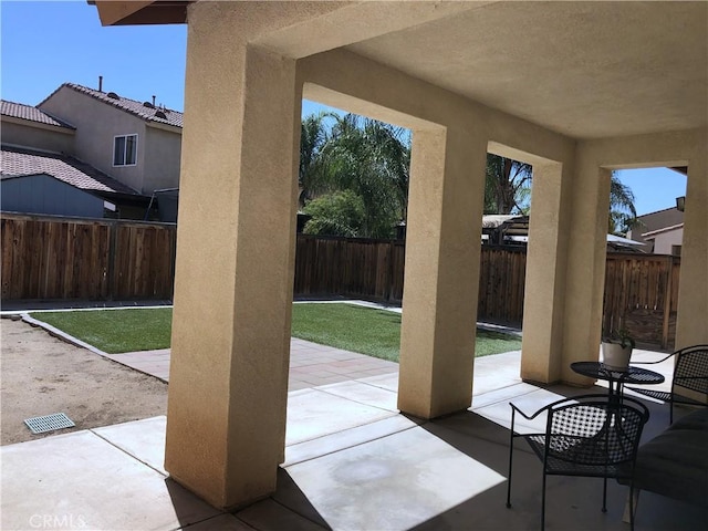 view of patio with a fenced backyard