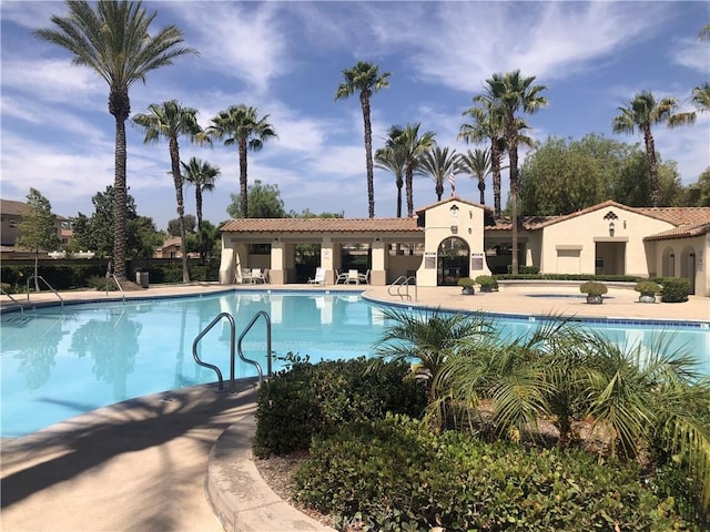 community pool featuring a patio