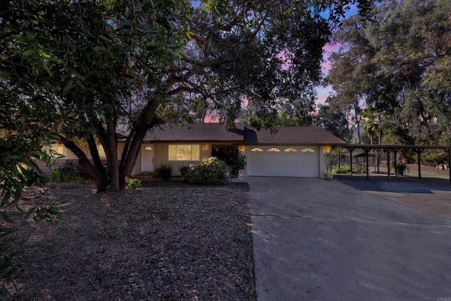 view of front facade featuring a garage and concrete driveway