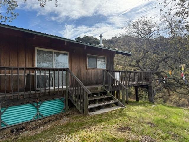 exterior space featuring a yard and a deck