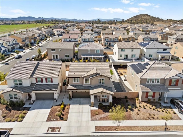 birds eye view of property with a residential view and a mountain view