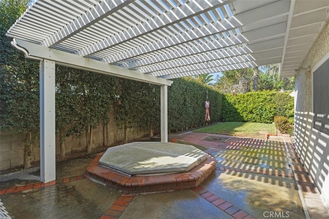 view of patio / terrace with a fenced backyard and a pergola