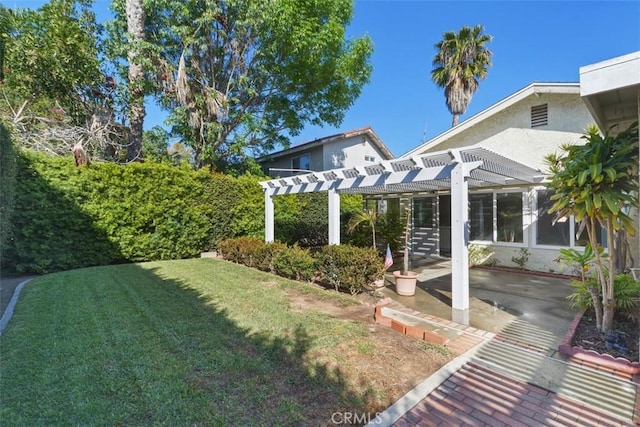 view of yard featuring a pergola and a patio