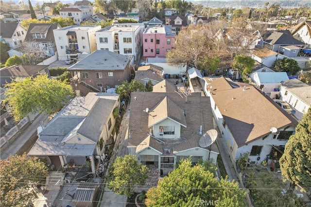 birds eye view of property with a residential view