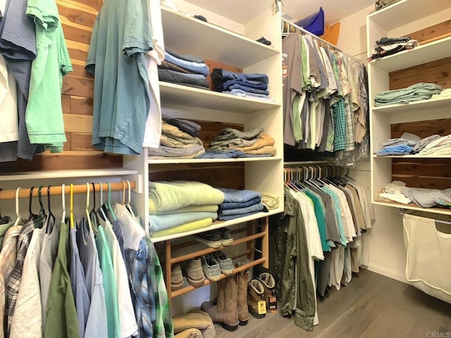 spacious closet featuring wood finished floors