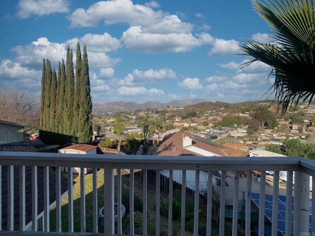 balcony featuring a mountain view