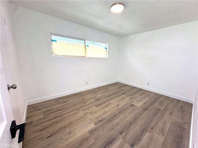 3659 W 110th St, Inglewood, CA 90303 - unfurnished room featuring wood finished floors and baseboards