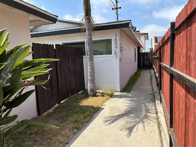 3659 W 110th St, Inglewood, CA 90303 - view of side of property with stucco siding