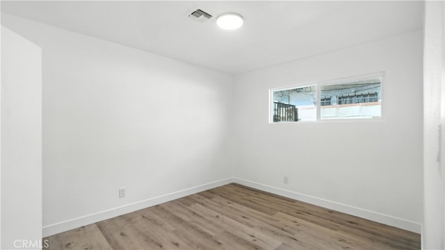 3659 W 110th St, Inglewood, CA 90303 - unfurnished room with baseboards and wood finished floors