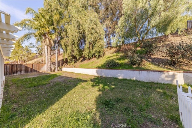 view of yard featuring fence