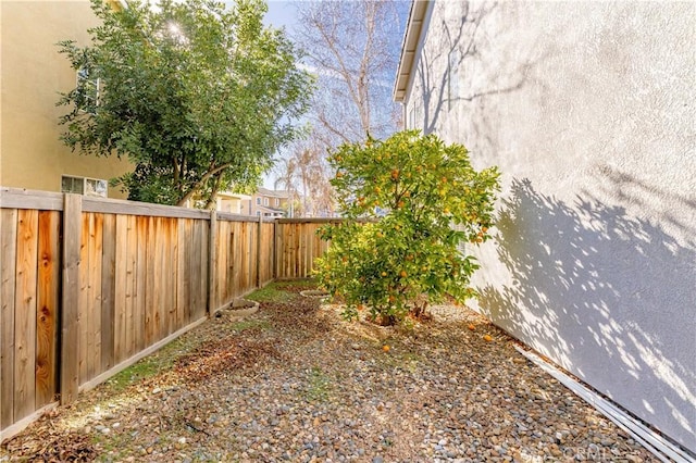 view of yard featuring a fenced backyard