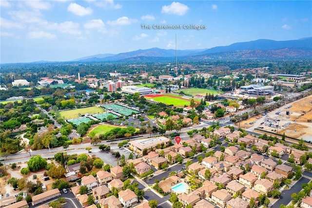 birds eye view of property featuring a mountain view