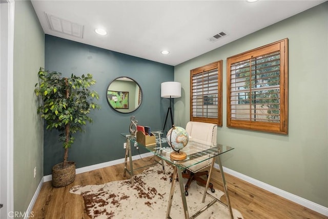 office area featuring baseboards, visible vents, wood finished floors, and recessed lighting