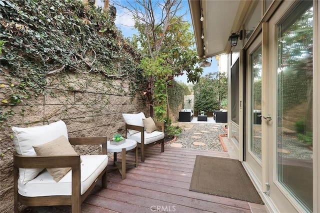 wooden deck featuring fence