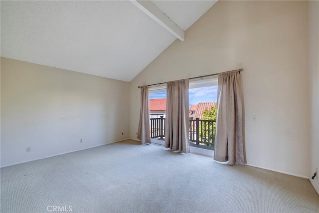 empty room featuring baseboards, high vaulted ceiling, beamed ceiling, and light colored carpet