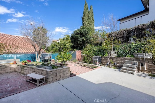 view of patio featuring a fenced backyard