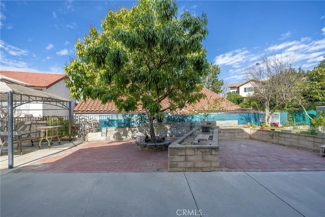 view of patio with fence