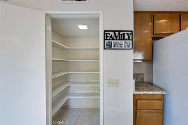 pantry featuring visible vents