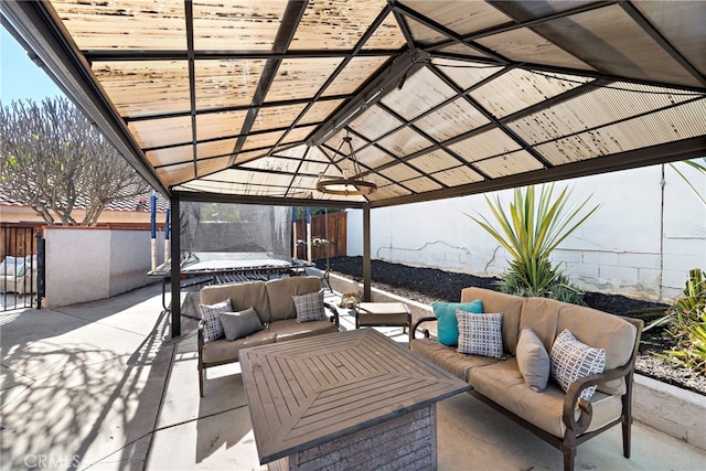 view of patio / terrace featuring a trampoline and an outdoor living space