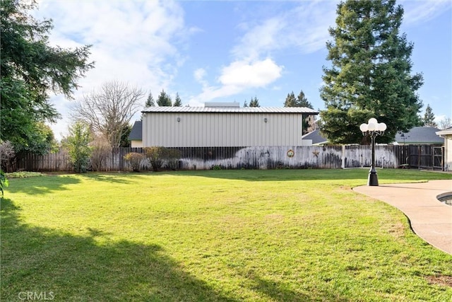 view of yard featuring a fenced backyard