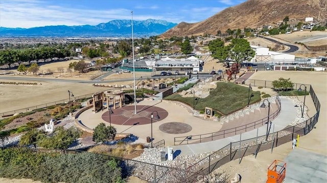 birds eye view of property with a mountain view