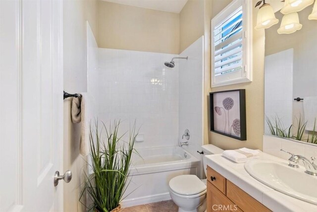 full bath with  shower combination, tile patterned flooring, vanity, and toilet