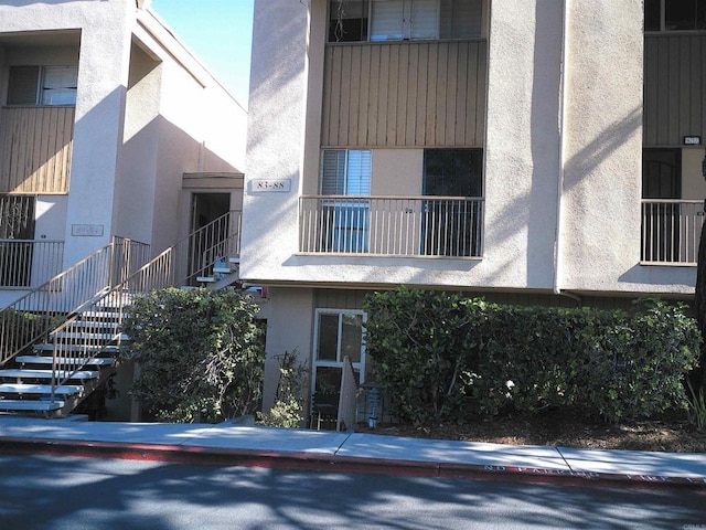 view of building exterior featuring stairway