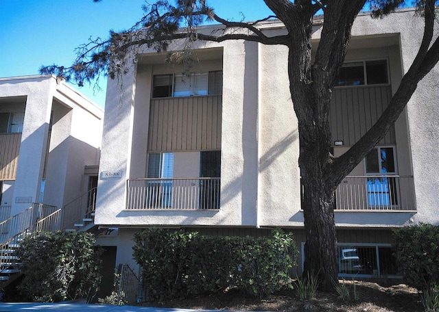 view of building exterior with stairs