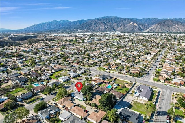 birds eye view of property featuring a residential view and a mountain view