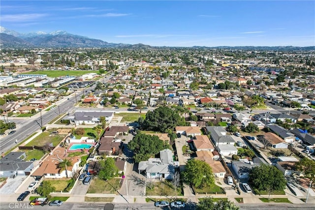 bird's eye view featuring a residential view and a mountain view