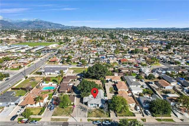 bird's eye view with a residential view and a mountain view