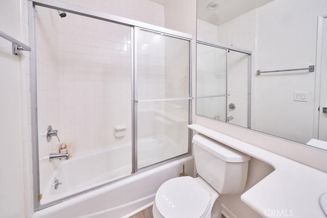 1617 S Beverly Glen Blvd Unit 303, Los Angeles, CA 90024 - full bath with toilet, shower / bath combination with glass door, and vanity